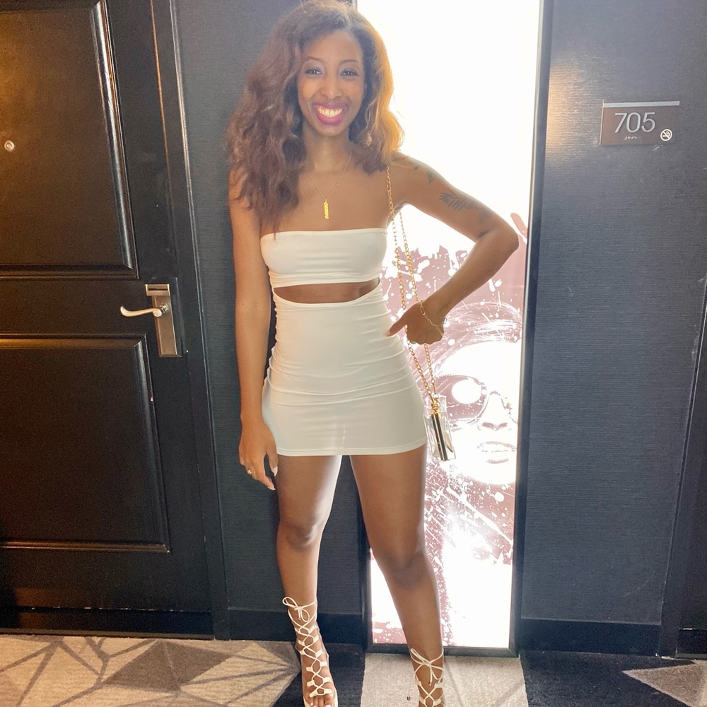 Cute mini dress with front slit.